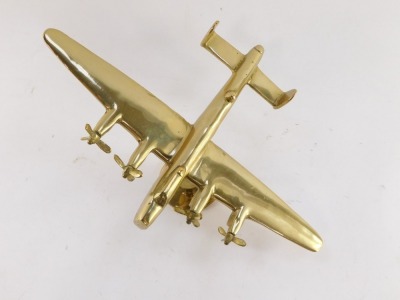 A brass aeronautical desk stand, modelled as a Avro Lancaster, 24cm wide. - 2