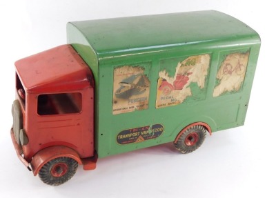 A Tri-ang tin plate transport van, number 200, with a red cab and green covered wagon, bearing advertising labels, registration LB2121, 48cm wide. - 2