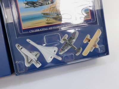 A Corgi die cast One Hundred Years of Flight, Showcase Collection, Sold In Support of the RAF Benevolent Fund Enterprises, comprising a Wright Flyer., Spitfire., Concorde and Space Shuttle, together with the Wright To Fly book, compiled by Peter R March, - 2