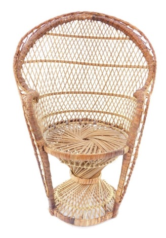 A rattan Morticia Adams peacock doll's chair, 63cm high.