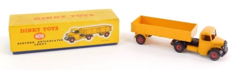 A Dinky die cast model of a Bedford articulated lorry, 409, boxed.