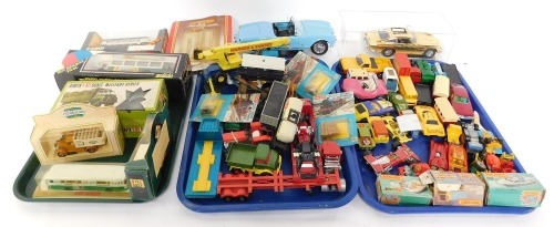 Corgi Matchbox Solido and other die cast vehicles, including a Renault Bus TN6C., James Bond's Aston Martin DB5., Matchbox Police Launch., articulated truck and Sea Fire Superfast Speed Boat, all boxed, Corgi Warner & Swasey Crane, and Hornby and other tr