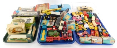 Corgi Matchbox Solido and other die cast vehicles, including a Renault Bus TN6C., James Bond's Aston Martin DB5., Matchbox Police Launch., articulated truck and Sea Fire Superfast Speed Boat, all boxed, Corgi Warner & Swasey Crane, and Hornby and other tr