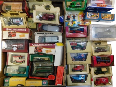 Matchbox, Dinky, Atlas and other die cast vintage trucks, military vehicles, Popeye and Olive Oil set, etc., all boxed or blister packed. (a quantity)