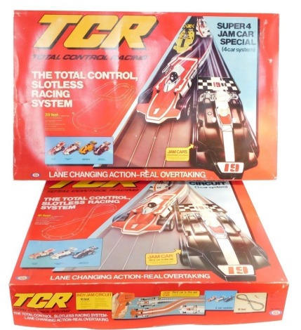A TCR Indijam circuit motor racing set, three car system, together with a Super four jam car speedway, both boxed. (2)