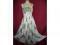 A 1950's size 14 Horrockses long evening gown in a cream ground with bunches