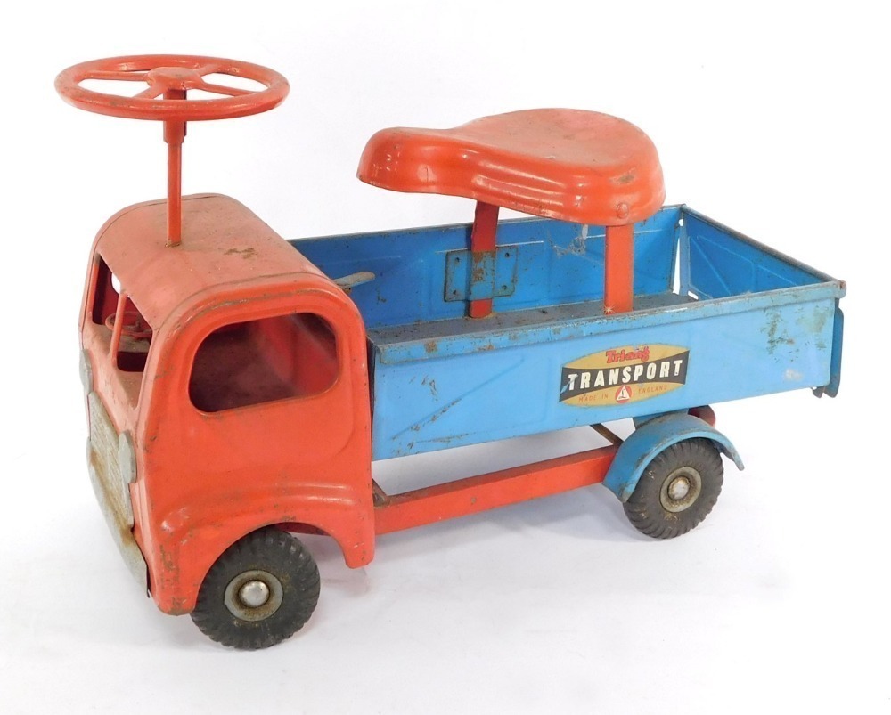 A Tri ang Transport mid century sit in vintage truck red and blue bears decals to