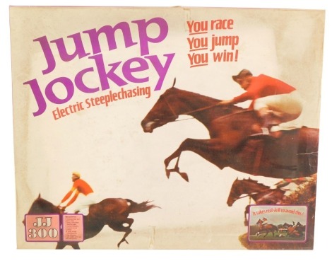 A Tri-ang Jump Jockey electric steeple chasing set, JJ300, boxed.