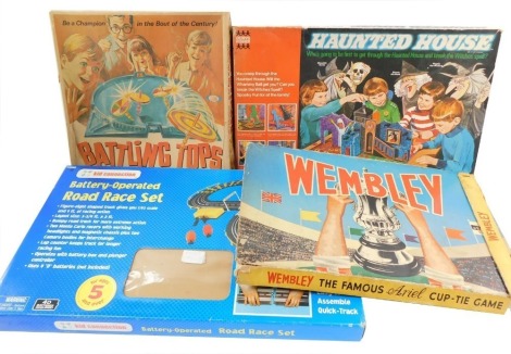 An Ideal Battling Tops Game, together with Haunted House., Wembley., and a Kid Connection battery operated Road Race Set, all boxed. (4)