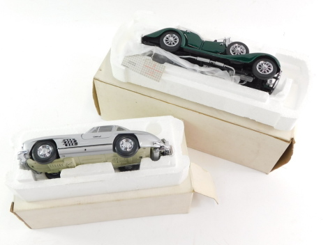 A Franklin Mint die cast precision model of a 1954 Mercedes Benz 300SL, together with a 1938 Alvis 4.3litre. (2)