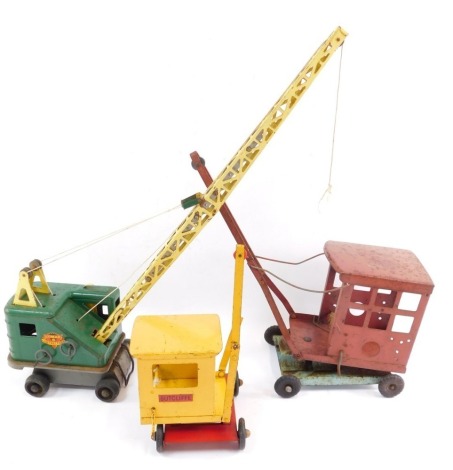 A Sutcliff tin plate crane, a Lumar tin plate contractor's crane, and a Tri-ang tin plate crane. (3)