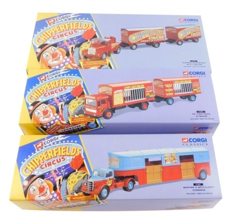 A Corgi Chipperfields Circus die cast Scammell Highwayman, with two trailers, 97915, together with a Bedford O articulated horse box, 97887, and an AEC cage truck and trailer, 97889, all boxed. (3)