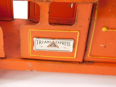 A Tri-ang Express tin plate locomotive, red livery, 54cm wide. - 2