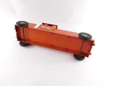 A Tri-ang Express tin plate locomotive, red livery, 54cm wide. - 3