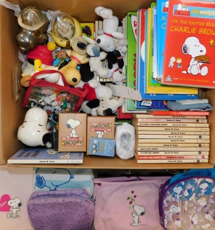 Snoopy collectables, including soft toys, DVDs, books, plastic figures, money boxes, and bags. (a quantity)