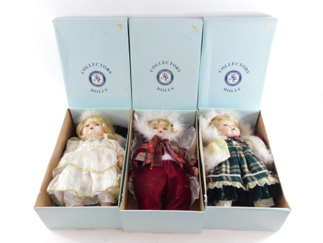 Three DeMarco Collection porcelain collectors dolls, boxed.