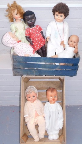 Seven plastic baby dolls, each in assorted dress, unmarked. (2 boxes)