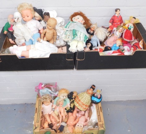 A quantity of dolls, to include a material patterned doll, a toilet roll Eastern style doll, female figures, Eastern figures, etc. (3 boxes)