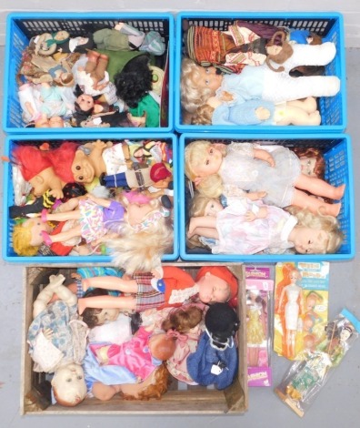 A large quantity of miscellaneous dolls, mainly plastic but some with material bodies, collectors dolls, European and other dolls, etc. (5 boxes)