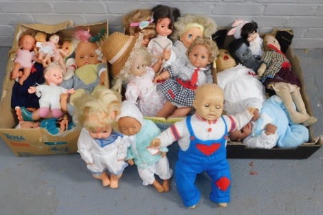 A quantity of dolls, to include mainly plastic modelled dolls, material dolls, crying girls, etc. (3 boxes)