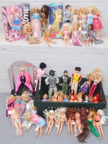 A group of Barbie, Sindy, and Action Men. (1 box)