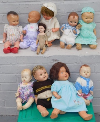 A group of papier mache and plastic headed dolls, to include one ceramic headed doll with material body marked DPC49?4. (2 boxes)