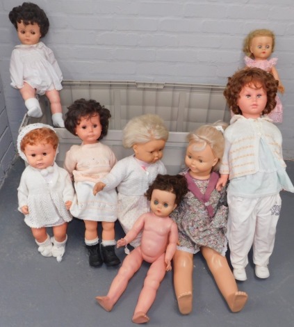 A large quantity of large dolls, all plastic bodied, unmarked, some with speech boxes. (1 garden storage trunk)