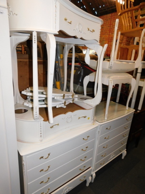 A French style cream painted bedroom suite, comprising two dressing tables and stools, two chests, wardrobe and two bedside cabinets. (9) - 4