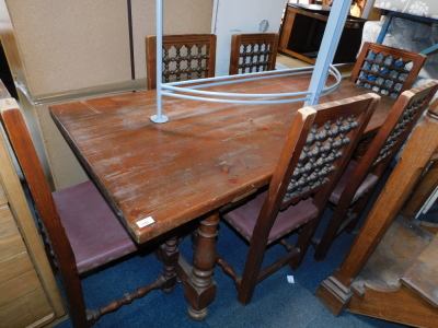 A Spanish pine dining table, with turned and splayed legs, with central iron stretcher, together with six chairs with bobbin turned back rests. (7) - 3