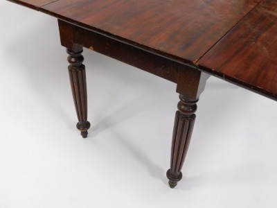 A Victorian mahogany drop leaf dining table, with reeded legs, 121cm wide, 124cm long when extended. - 6