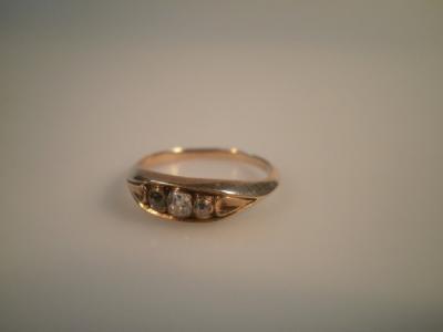 A three stone diamond ring