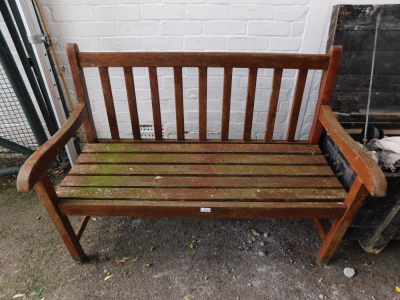 A teak garden bench. - 3