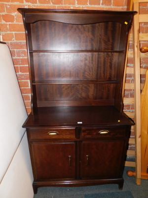 A Stag dresser, with open rack.