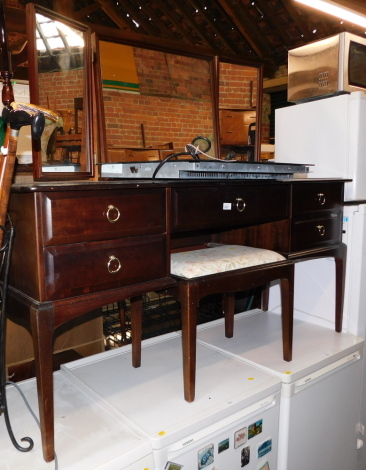 A Stag mahogany dressing table, with stool. (2)