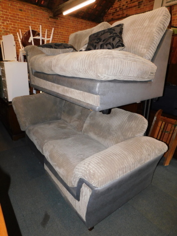 A grey snakeskin effect and corded fabric corner sofa.