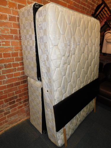 A divan bed and mattress, with a black leatherettte headboard. (3)