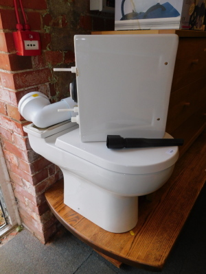 A white ceramic lavatory with soft close seat.