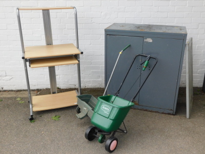 A steel office cupboard, computer station and two seed drills. (4)