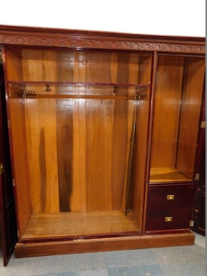 An Edwardian mahogany triple wardrobe, with a mirrored door and panel doors, on a plinth, label to interior For Scottish Co-Operative Wholesale Society Ltd Cabinet Factory Shield Hall, 196cm wide. - 4