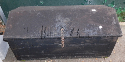 A pine chest, with rope handles and pitched lid.