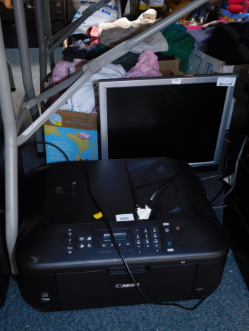 A Canon Pixma MX53S colour printer, and monitor.