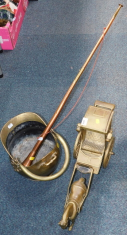 A brass horse and carriage, together with a brass coal scuttle, and a copper coaching horn. (3)