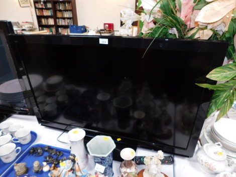 A Panasonic 41" flatscreen television, with remote.