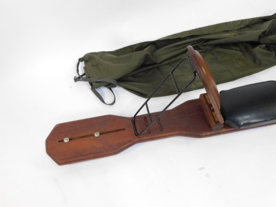 A boat board seat, with adjustable back support, built by Barry J Pond., 177cm wide, padded seat, together with a Wychwood Para-Drougue/drift parachute. (3) - 2