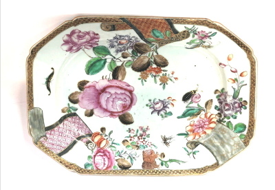 An 18thC Chinese porcelain octagonal serving platter, enamelled with peonies, insects and butterflies, diaper border with three scrolls, all in tones of pink, green, orange brown and gilt, 29cm wide. - 7