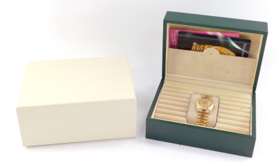 A Rolex gentleman's 18ct gold cased Oyster Perpetual day-date wristwatch, circular gold dial baring Roman numerals, date and day apertures, centre seconds, superlative chronometer, on an 18ct gold bracelet strap, cased and outer boxed. - 5