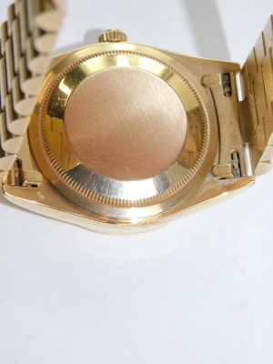 A Rolex gentleman's 18ct gold cased Oyster Perpetual day-date wristwatch, circular gold dial baring Roman numerals, date and day apertures, centre seconds, superlative chronometer, on an 18ct gold bracelet strap, cased and outer boxed. - 8