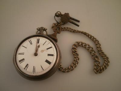 A George III silver pair cased pocket watch marked for Baggs