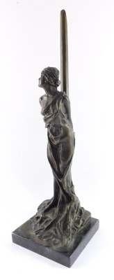 A bronze figure of Andromeda, modeled standing chained to a post, raised on a black marble base, 49cm high. - 9