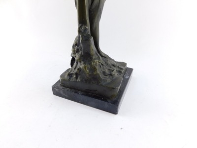 A bronze figure of Andromeda, modeled standing chained to a post, raised on a black marble base, 49cm high. - 4